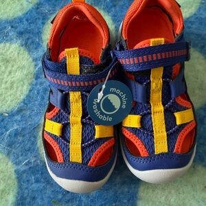 Stride Rite Wade Kid’s Machine Washable Closed Toe Sneaker Sandal Blue Orange